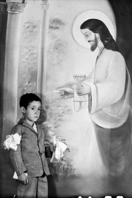 Niño el día de su primera comunión, retrato