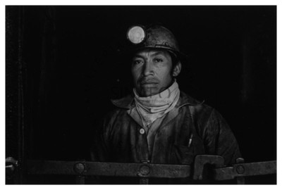 Minero con casco, retrato