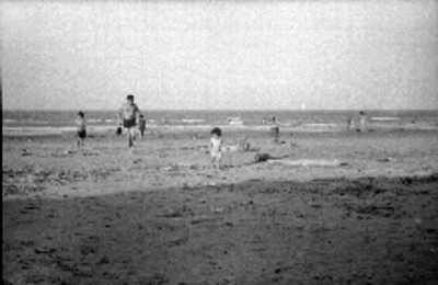 Turistas divirtiéndose en la playa de Tecolutla
