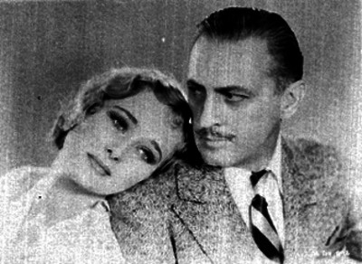 John Barrymore acompañado de una actriz, retrato