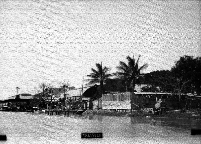 Embarcadero y casas rústicas en ribera del Río Tamesí en "Tampico"