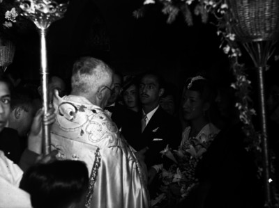 Sacerdote celebrando la boda del hijo del licenciado Francisco Doria Paz