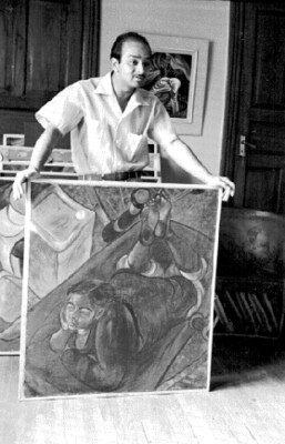 Satish sostiene pintura, retrato