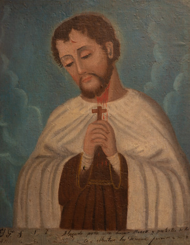 Santo con cruz